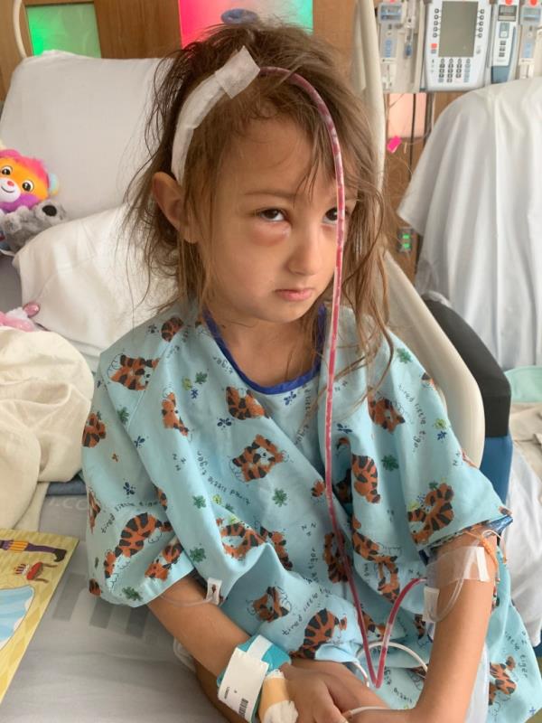 A photo of injured Zoey Seth in the hospital, her eyes swollen.